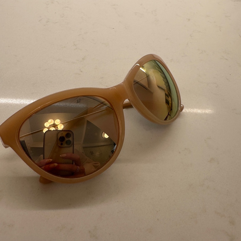 Tory Burch sunglasses. Nudey pink gold wiring. Cat eye style. Reflective lenses